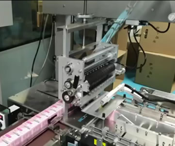 Plastic sealing film packaging machine
